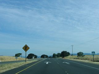 Departing California 12 west and California 29 north, a two-lane ramp carries California 221 north onto Soscol Avenue in Napa.