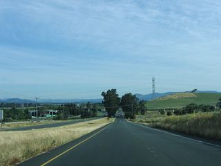 California 221 (Soscol Avenue) is a four-lane, divided expressway as it approaches the city limits of Napa.