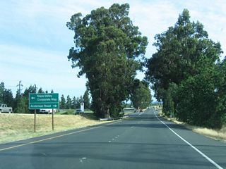The first traffic signal on northbound California 221 (Soscol Avenue) is for Napa Valley Corporate Way and Anderson Road.