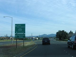California 221 north comes to an end as it approaches California 121 at Imola Avenue. California 121 takes over the continuation of Soscol Avenue north into Napa; the expressway standards come to an end at this traffic signal/