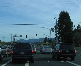 Northbound California 221 (Soscol Avenue) meets California 121 (Imola Avenue) at this busy traffic signal.