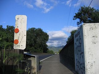 The only bridge along California 222 is a long one; it carries the state highway over the Russian River, which flows between Ukiah and Talmage. Built in 1964, the bridge features old style concrete guardrails that are common from that period of construction.