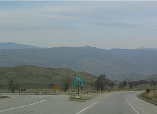 California 223 reaches its eastern terminus at its intersection with California 58 in the shadows of Bear Mountain. This is one of two at-grade intersections along California 58 between Bakersfield and Mojave; the other is just a mile east of here at the Caliente turn-off.