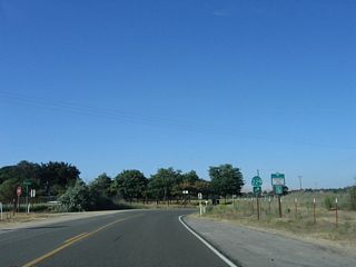 SR 229 (Webster Road) overtakes Rocky Canyon Road at this intersection. Paralleling the West Branch of Huerhuero Creek, the state route angles northeast on the ensuing stretch. What was the first reassurance shield for SR 229 posted here was removed by 2016.