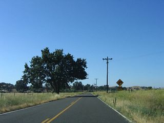 Passing between the West and Middle Branches of Huerhuero Creek, SR 229 resumes a northeasterly heading from this sharp curve at post mile 7.00.