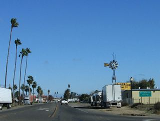 California 233 (Robertson Boulevard) enters the city of Chowchilla.  Located at an elevation of 237 feet, Chowchilla covers either four square miles (per City webpage) or seven miles (per U.S. Census Bureau) in northern Madera County. The population of Chowchilla was 11,127 as of the 2000 Census.