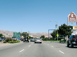 Eastbound California 237 (Calaveras Boulevard) turns northeast at the intersection with Serra Way.