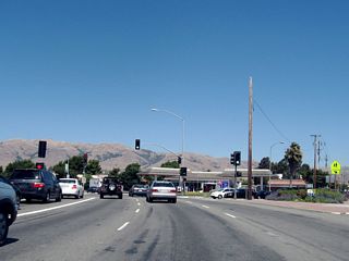 The next traffic signal is a connection with Serra Way.