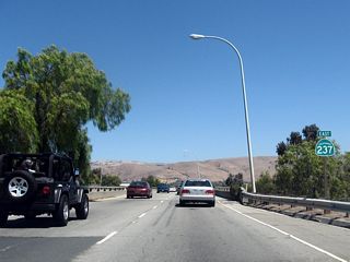 Another California 237 east shield assembly is posted after the railroad viaduct.