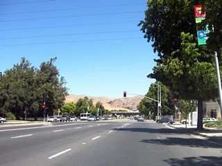 After the Town Center area, eastbound California 237 approaches Hillview Drive, which is the final traffic signal prior to reaching Interstate 680.