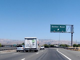 Eastbound California 237 reaches Exit 8, Zanker Road south to Agnews Developmental Center and eventually downtown San Jose. Zanker Road and North First Street generally parallel each other.