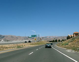 Exit 9 C follows for Interstate 880 north to Oakland with an additional ramp for high occupancy vehicles.