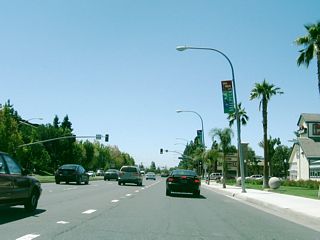 Westbound California 237 at the traffic signal for the Town Center commercial area. The civic center is located on the north side of Calaveras Boulevard.