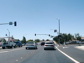 Westbound California 237 (Calaveras Boulevard) meets Milpitas Boulevard at this traffic signal.