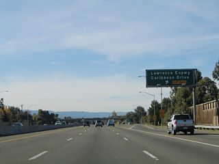 Westbound California 237 (South Bay Freeway) reaches Exit 5, Santa Clara Route G-2 (Lawrence Expressway) south and Caribbean Drive north.