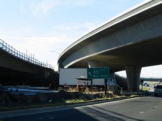Passing under the transition ramps from California 237 east to Interstate 880 north (which were under construction back in 2004 but are complete as of 2008), westbound California 237 changes into a freeway configuration. Bear right at this point to connect to Exit 9A, McCarthy Boulevard and Cypress Street.