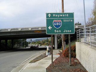 After the traffic signal for the connection to Interstate 680 north, the next left turn connects to Interstate 680 south to San Jose (after passing under Interstate 680).