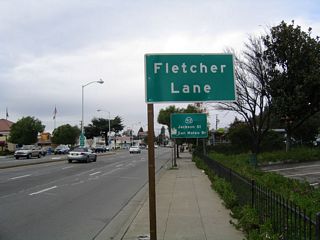 One block before the busy California 92-185-238 intersection (Five Corners), Fletcher Lane offers the only connection from California 238 north to California 92 west. All traffic to California 92 should turn left on Fletcher Lane, then turn north on Watkins Street to Jackson Street.