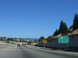 Traffic from Interstate 238 south merges onto California 238. The first traffic signal on southbound California 238 is with Castro Valley Boulevard.