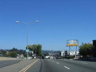 After the Castro Valley Boulevard intersection, California 238 enters the city of Hayward, which is known as the "Heart of the Bay." Encompassing 62.55 square miles, Hayward is the third largest city in the East Bay (only after Oakland and Fremont). Total population as of the 2000 Census was 140,030. Hayward was incorporated as a town in 1876 and as a city on September 18, 1928.