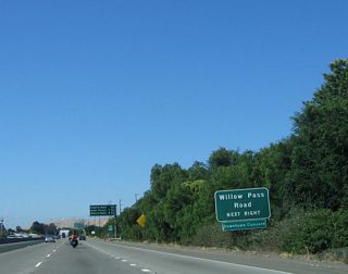 Approaching downtown Concord, Clayton Road splits into a one-way couplet shared with Concord Boulevard near Ellis Lake Park. To the civic center, follow Clayton Road east to Port Chicago Highway north, then turn east again on Willow Pass Road.