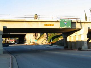 Skipping ahead to Banning at the bottom of the grade, northbound California 243 passes under the Union Pacific Railroad viaduct, then approaches its northern terminus at the Interstate 10 freeway.