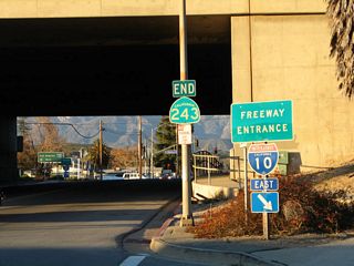 This picture shows the same intersection, with a view underneath the Interstate 10 bridge.