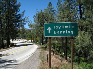 California 243 travels north from the intersection with California 74. A small guide sign advises that this is the road north to Idyllwild and Banning.