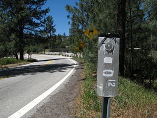 A California 243 postmile marker is located next to the route marker.