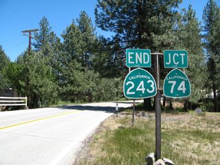 California 243 is a scenic route connecting California 74 (Pines to Palms Highway) with Interstate 10 near Banning via Idyllwild. Generally, much of its journey from south to north is from higher to lower elevations. This picture shows California 243 as it ends at California 74 just south of Idyllwild. The community of Idyllwild is locally famous for rock climbing and stellar mountain scenery.