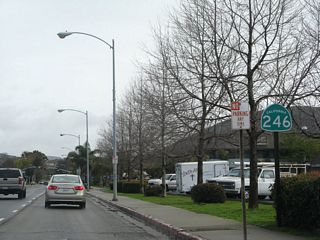 The reassurance marker for SR 246 posted along Ocean Avenue after A Street omits SR 1 south.