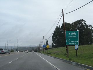 SR 1/246 shift northeast from Ocean Avenue at 7th Street ahead of their separation. SR 246 continues east toward Buellton and Solvang, while SR 1 turns southeast toward Gaviota and Santa Barbara.