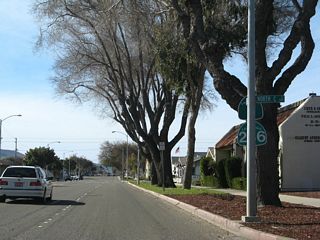 Reassurance markers for SR 1/246 posted along Ocean Avenue west of C Street were removed by 2017.