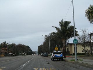 A more normal looking California 246 west shield is posted on Ocean Avenue after the L Street intersection.