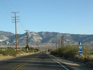 SR 247 (Barstow Road) intersects Old Woman Springs Road bu Cafe 247 in the community of Lucerne Valley. SR 247 and SR 18 do not directly meet, but state-maintained sections of Barstow Road south and Old Woman Springs Road west link the two routes.