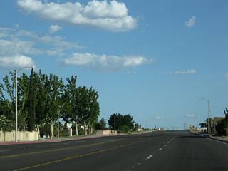 Climbing uphill, California 247 retains five lanes to the top of the grade.