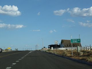 Turn right on Veterans Parkway to the Veterans Home of Barstow. Ahead, California 247 narrows to two lanes and will quickly leave the urban area.