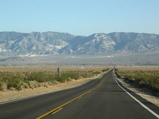 SR 247 bee lines south from near Peterman Hill across Lucerne Valley. The state route travels across the Lucerne Dry Lake, which is evident by the sudden lack of foliage and ample dry caked mud on both sides of the road.