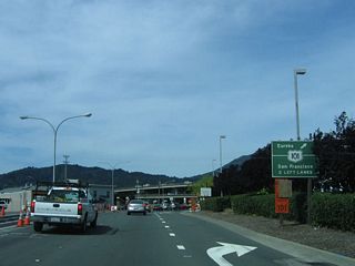 Now four lanes, Sir Francis Drake Boulevard west approaches U.S. 101 (Redwood Highway).