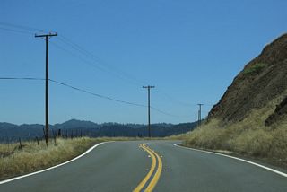 Pine Ridge rises near the midpoint of California 253, and then Booneville Ukiah Road descends into Bell Valley.