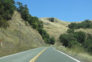 Making a gradual turn to the west into Anderson Valley, which is part of the Navarro River watershed, SR 253 advances by hills and ranch land.