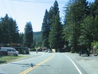 Southbound California 254 (Avenue of the Giants) enters the community of Redcrest. Some services including a general store are located here.