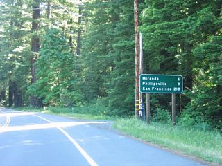 This mileage sign on southbound California 254 (Avenue of the Giants) provides the distance to Miranda (6 miles), Phillipsville (9 miles), and San Francisco (218 miles).