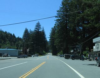 Southbound California 254 (Avenue of the Giants) enters the town of Miranda.
