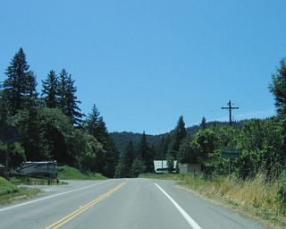 California 254 (Avenue of the Giants) enters Phillipsville and again leaves Humboldt Redwoods State Park.