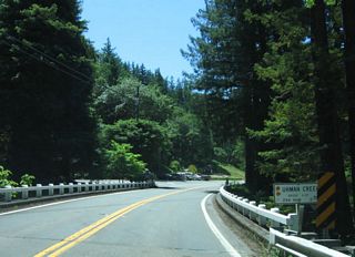 Shortly thereafter, California 254 crosses Ohman Creek on this bridge. Note the old-style white, wooden bridge railing still in place.