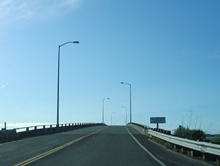 The next bridge connects Woodley Island with Indian Island via Carl Christensen Memorial Bridge.