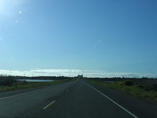Leaving Indian Island, California 255 approaches the third of three bridges that connects the highway to Samoa.