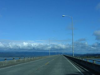The Richard F. Denbo Memorial Samoa Bridge carries California 255 on the first span of the Samoa Bridge over Humboldt Bay. There are limited shoulders on the bridge. The first span is the longest of the three spans that carry California 255 south (east) to Eureka.