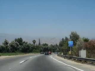 A callbox at post mile 1.00 next to the H Street under crossing references the State Route 259 designation California 259.